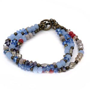 Triple bracelet with toggle lock.